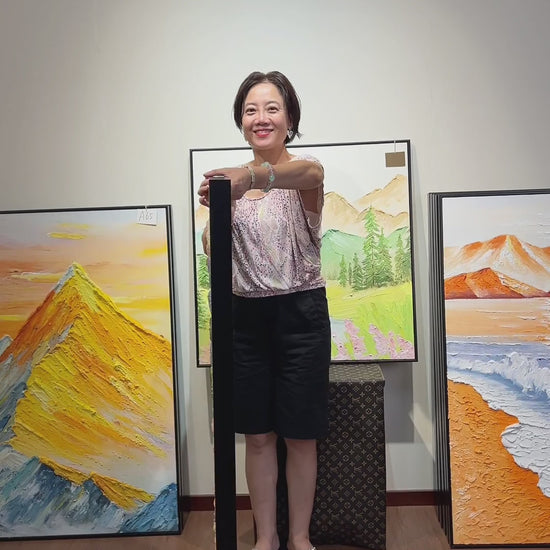 Supplier turns the pastel butterfly artwork to the front, followed by a framed wall presentation