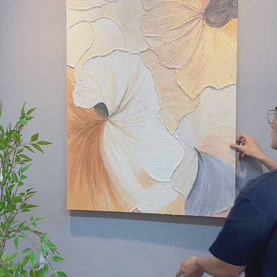 Full view of the pastel abstract, a hand touching the raised surface, oblique texture details and a final complete view
