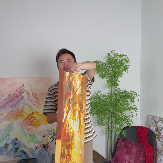 The autumn tree painting turns into frontal view, followed by its complete framed presentation on an ivory wall.