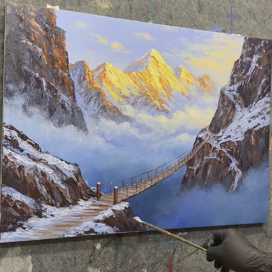 Painting the golden mountains, snowy canyon cliffs and wooden bridge, followed by the completed framed landscape