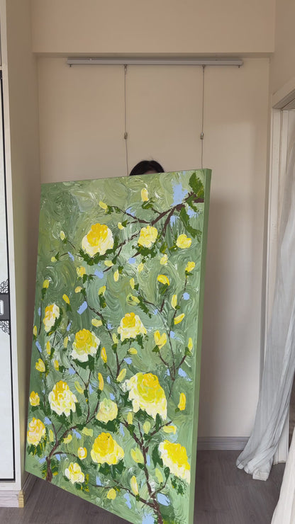 Studio video showing the yellow rose painting turning towards a full frontal view
