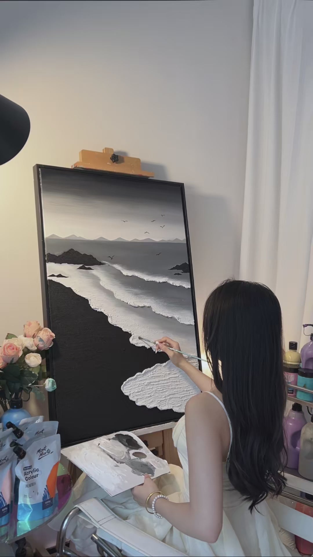 Real painting process showing the grey sky, distant mountains, black rocks and sand, white surf texture, seven birds and the finished seascape