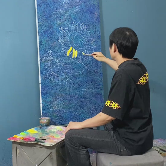 Painting sunflower petals, leaves and flower centres, followed by a frontal view of the completed blue-ground canvas
