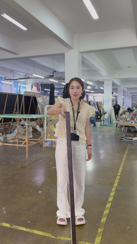 Workshop video showing the butterfly painting turning from its side profile to the full front