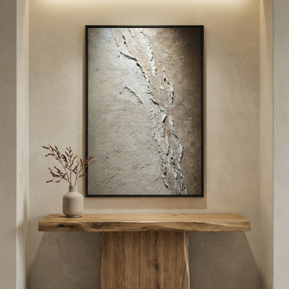Resonant Strata above a wood console in a warm neutral entryway